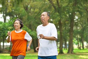 Mature couple jogging